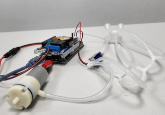 Prototype connected to the vacuum-actuation test setup.
